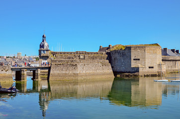 Fototapeta na wymiar Concarneau's Harbour and its Medieval part Ville Close which is a walled town on a long island in the centre of the harbour. Brittany, France