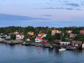 Vacation homes on island in Stockholm Archipelago Sweden, view from cruise ship