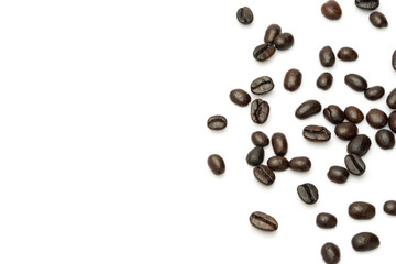 abstract piled of coffee beans group roast dark brown colour textured isolated on white backgrounds