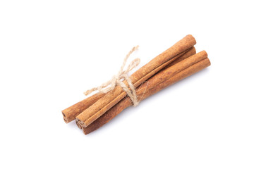 cinnamon sticks isolated on white background, a bundle of natural herb with dark brown colour