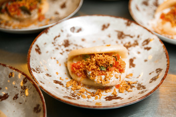 Kebab with rotan in a bun.