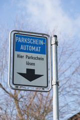 sign for pay here for a parking ticket