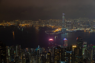 Fototapeta premium Cityscape famous Hong Kong buildings towers by night harbor