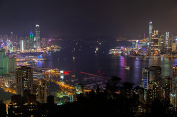 Fototapeta na wymiar Cityscape Hong Kong city illumination reflected in water