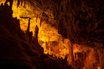 Formations of stalactites and stalagmites in a cave. Mallorca, Spain