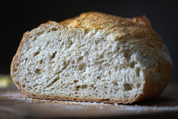 Sliced boule bread with butter