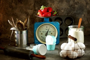 Ingredients for baking - flour, eggs, salt, baking powder, rolling pin.