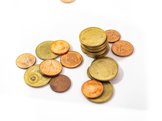 Thai Baht Coins colors Gold set in the mountains,Is the currency of Thailand.For business expenses,Coin is in a jar of money saving,White background