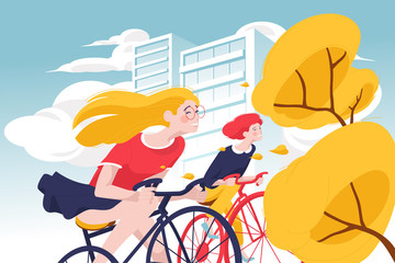 Fototapeta na wymiar Young happy women riding bicycle in city