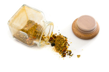 Oriental spices in containers on a white background. Spice mix for pilaf.