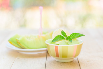 ice cream melon on wood table
