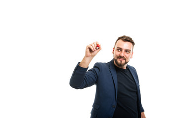 Business man wearing smart casual clothes writing with red marker