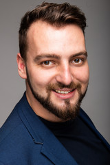 Portrait of business man wearing smart casual clothes smiling