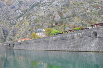 Fototapeta na wymiar Kotor is a coastal town in Montenegro. The Old City of Kotor is a well preserved urbanization typical of the middle Ages with Medieval architecture and numerous monuments of cultural heritage.