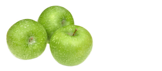 group of three green apples isolated on white background