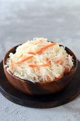 Sauerkraut in a wooden bowl. fermented vegetables