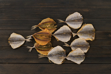 sun-dried fish on a wooden background