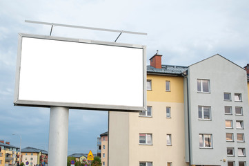 Blank white billboard for advertisement on the residential area