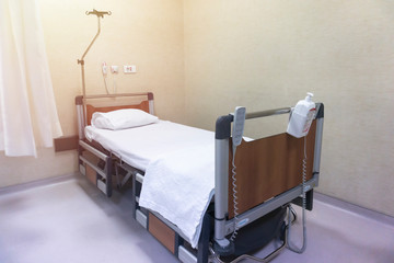 Empty bed in a hospital ward