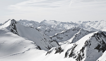 Fototapeta na wymiar Alpine winter wonderland in Europe. Mountains in Austria in the Alps of Tyrol. Glacier Stubaier Gletscher. Panorama view