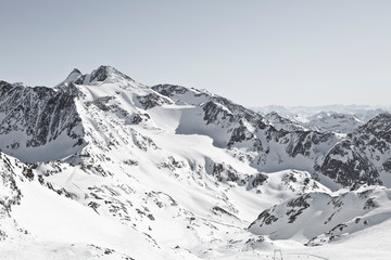 Alpine winter wonderland in Europe. Mountains in Austria in the Alps of Tyrol. Glacier Stubaier Gletscher. On top