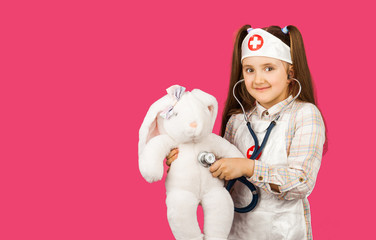 Pretty cute preschool child girl wear medical uniform