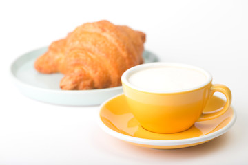 yellow cup on a white  background