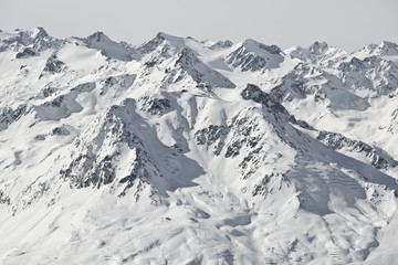 Fototapeta na wymiar Alpine winter wonderland in Europe. Mountains in Austria in the Alps of Tyrol. Glacier Stubaier Gletscher. Awesome panorama