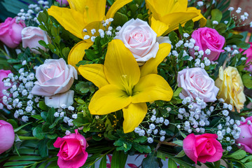 Beautiful bouquet of flowers for sale in street market in Vietnam, close up