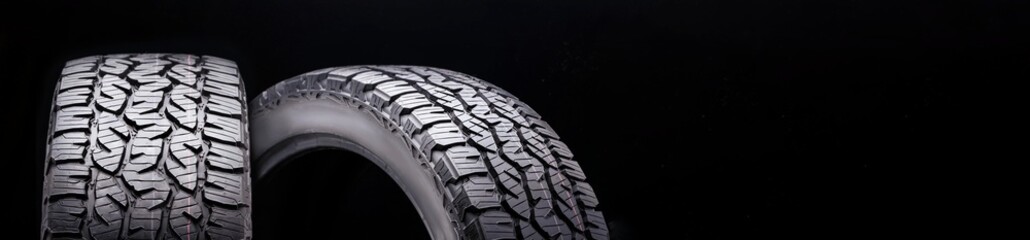 matador izzarda at 2-all-season off-road tires all terrain, sidewall close -up on a dark background