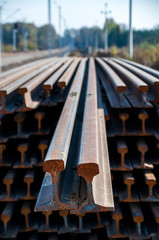 Closeup of rails ready to be mounted on the railroad. Railway maintenance works