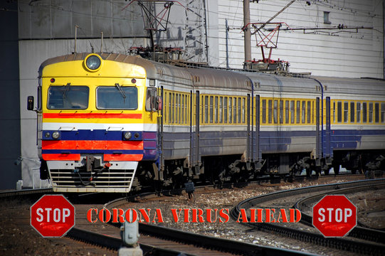 Conceptual image of corona virus warning - stop signs before approaching train