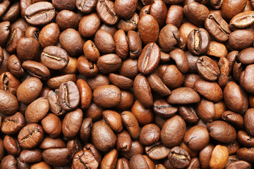 Many coffee beans as background