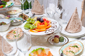 served Banquet table with snacks and fruit,