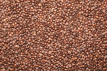 Many coffee beans as background