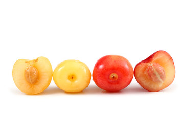 Yellow and pink cherries and halves
