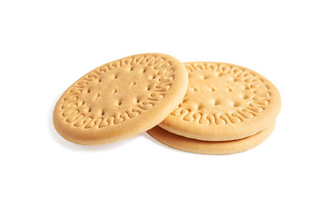 Round cookies on a white background. Wheat biscuits on the table. Morning breakfast cracker snack. Wheat light meal snack in lunch time.