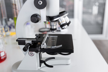 Microscope in laboratory. Medical equipment technology and research concept.