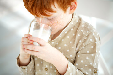 The child is drinking milk.