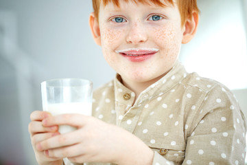 The child is drinking milk.