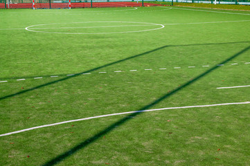 Closeup of green grass surface on soccer court