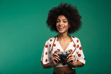 Portrait of a happy young african woman standing