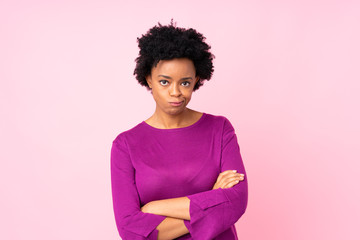 African american woman over isolated pink background feeling upset