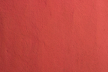 Red plaster wall texture stucco background