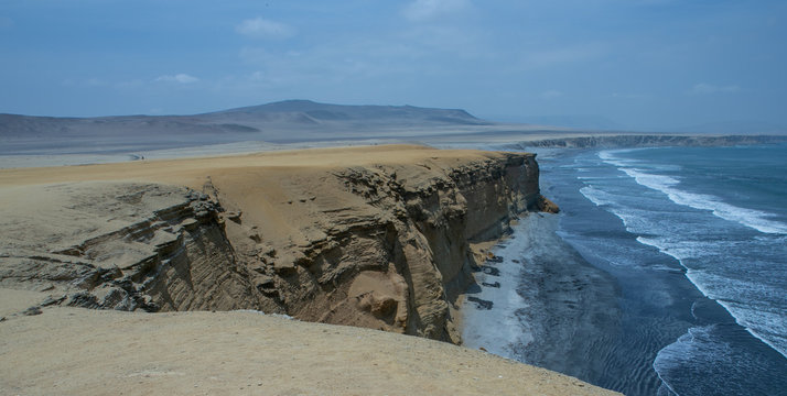 Waves at Paracas national park. Peru. Panorama. Ocean and desert. Playa el puente. Coastal. Rocks