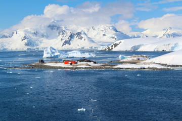 Frozen coasts, icebergs, mountain and the Chilean González Videla Antarctic Base in  Paradise Bay on the Danco Coast, Antarctica