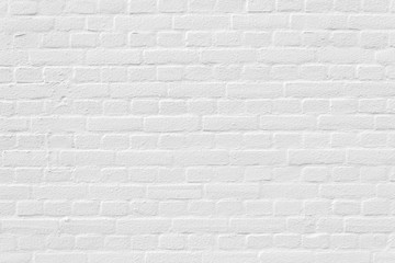 White painted clean brick wall with some relief background texture
