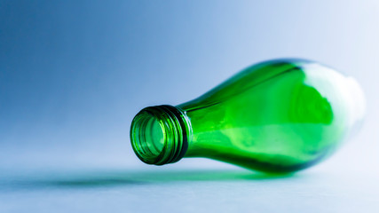 green bottle on a white background