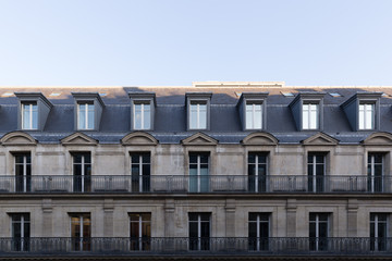 Typical roofs and facades details of buildings in Paris, France