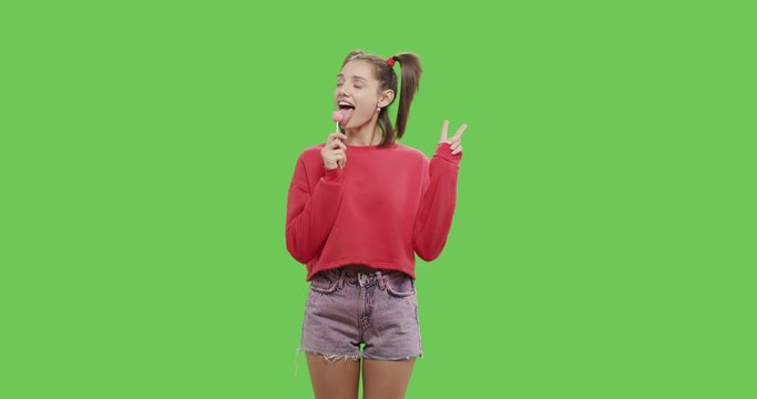 girl with big red lollipop
